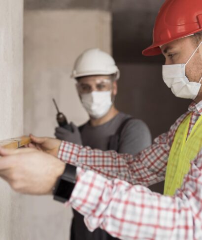 BMK Trust Mark side-view-men-working-with-masks